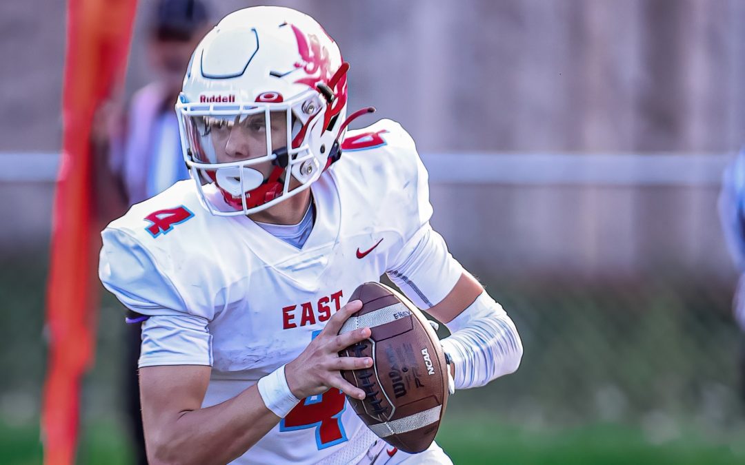 CIC FOOTBALL: Austin Johnson makes first start at QB, throws 2 TDs to help East slip by South 20-12