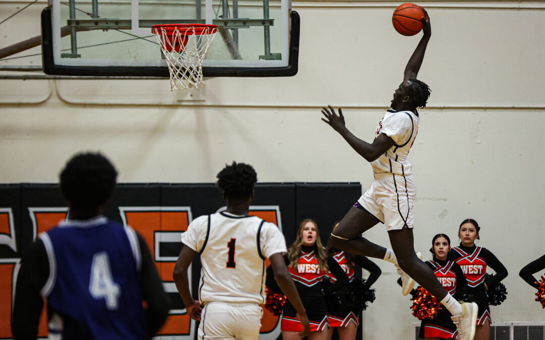 Prep Hoops: ‘Air Chuol’ takes flight for West boys as Eagles soar into final four of CIC Tournament (plus, Dimond boys, Service & West girls prevail)